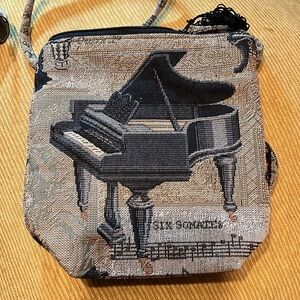 Dancing Cat crossbody bag made by artist Helen Loft as a personal creation